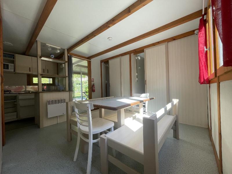 Camping Le Jardin - chalets, bungalows et emplacements nus pour des vacances nature le long de la rivière le Gijou