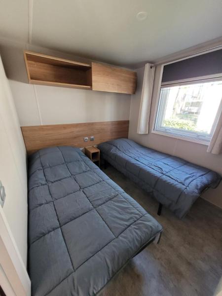 MH 170 AVENTURA 3 chambres dont une suite parentale et 2 salles de bain dans camping 4étoiles