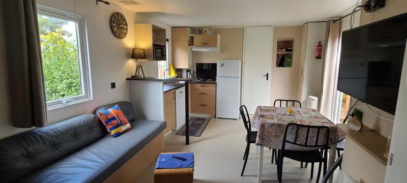 Mobilhome 6 personnes climatisation, TV, lave-vaisselle, 2 salle de bain, 3 chambres au camping Les Vignes à Lit-et-Mixe dans les Landes avec piscine,