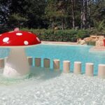 Piscine enfant avec champignon arroseur au Camping Parc Saint Sauvayre