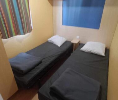 Chambre avec deux lits individuels dans le Camping Tohapi Coeur de Vendée