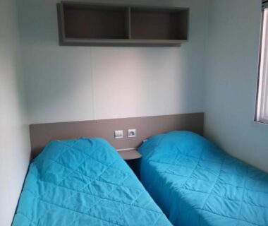 Chambre avec deux lits simples dans le Cordon LMP
