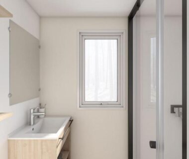 Salle de bains avec douche vitrée et lavabo de l'Eco-Lodge Lou Pantaï