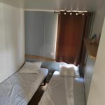 Chambre avec deux lits simples dans Indivision Courbin Pebay Jérémy et Alexia