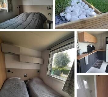 Terrasse en bois et chambre avec deux lits dans le Logement calme