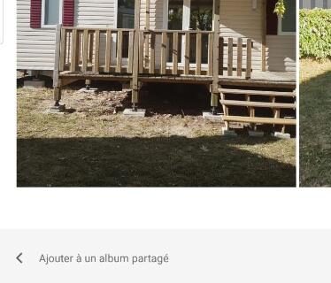 Terrasse en bois devant le mobil home Amira 3 Trigano