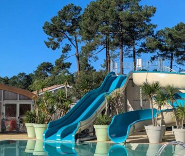 À Lege Cap Ferret piscine avec toboggans dans le camping Mobil-home neuf suréquipé 6 pers 3 chambres