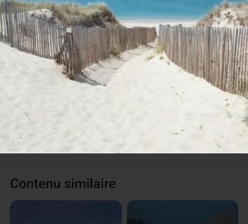 Accès plage sablonneux entre dunes et barrières en bois du Mobile home