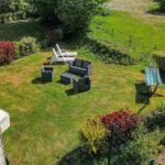 Espace extérieur avec salon de jardin du Mobilhome Normandie