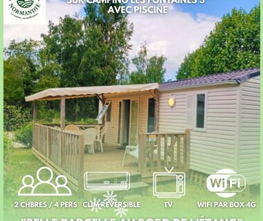Terrasse au bord de l'étang avec mobilhome Mobilhomes Cozy 2 ou 3 chambres en bordure d'étang Camping 3 étoiles