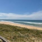 Plage et dunes face à l'océan depuis la terrasse du camping Rêves de pins