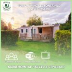Devant le mobilhome sur parcelle gazonnée au Séjour Normandie Mobilhome confort 3ch 6p 164