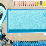 Piscine du camping avec toboggan et transats au ZEcamping 4 étoiles familial